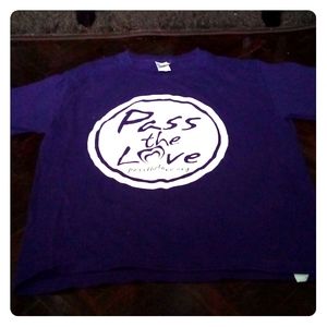 I am selling a purple shirt that says Pass the Lov